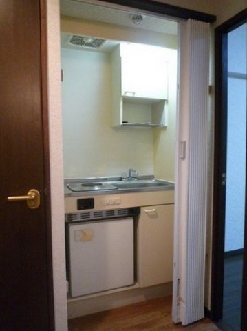 Kitchen. 1-neck electric is with a stove