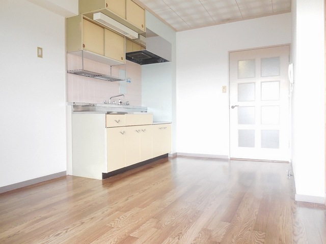 Living and room. Kitchen also is full of light