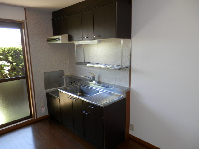 Kitchen. Bright kitchen take a lighting because it is next to the sash