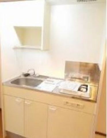 Kitchen. 1-neck with stove