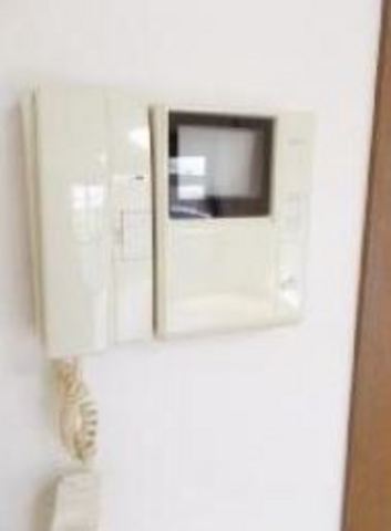 Other room space. There is a display with intercom of peace of mind