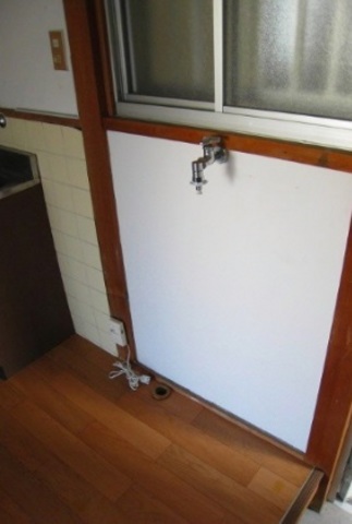 Other room space. There Laundry Area in the room