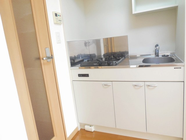 Kitchen. 2-neck kitchen with a stove