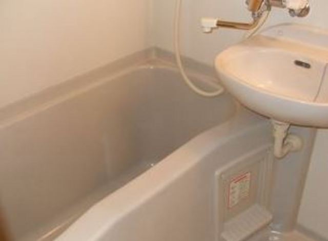 Bath. It is a clean bathroom