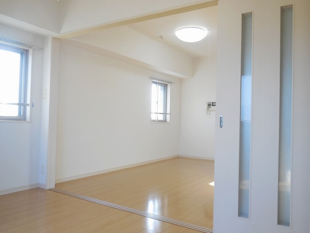 Living and room. Bright keynote of flooring