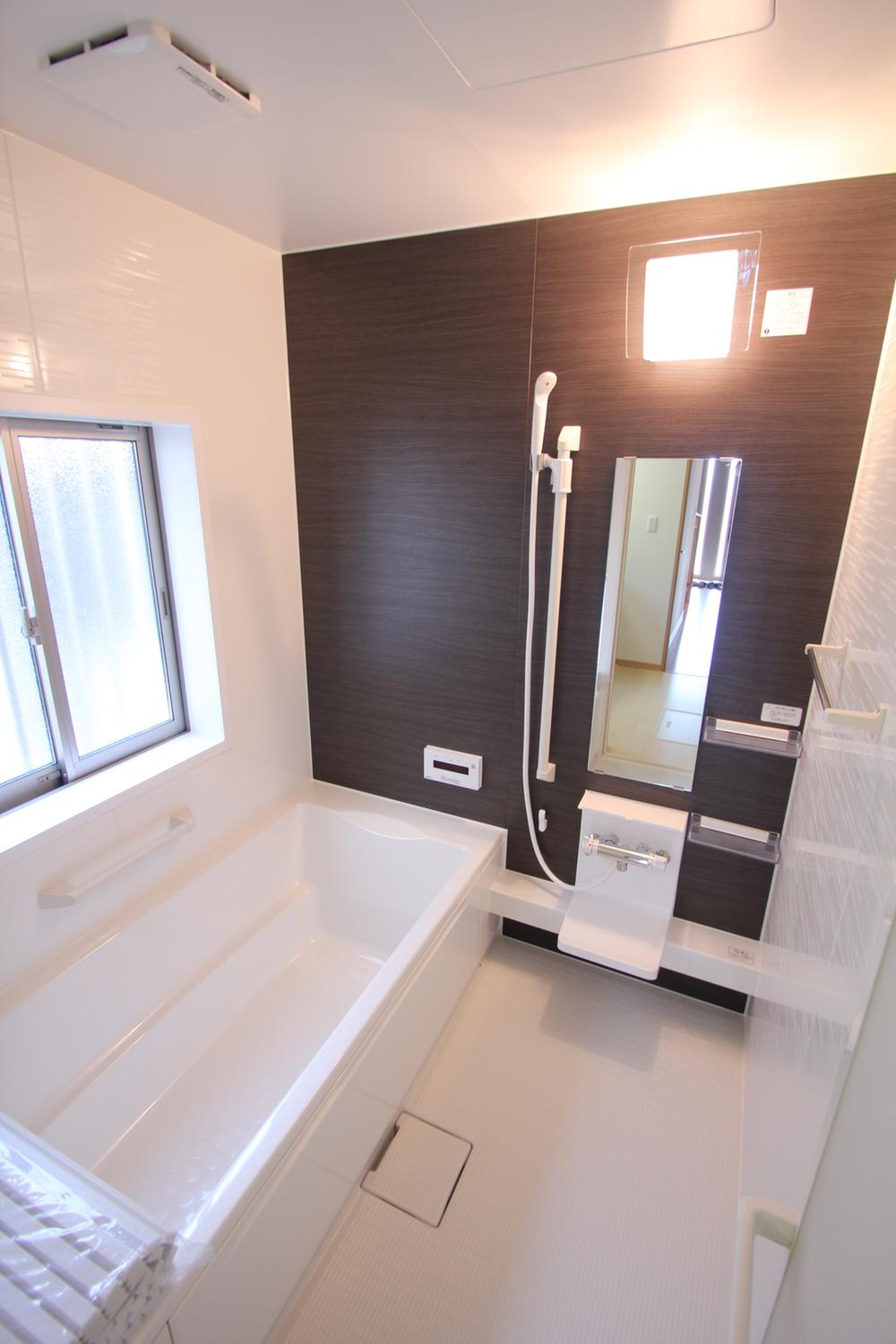 Bathroom. The photograph is the same type