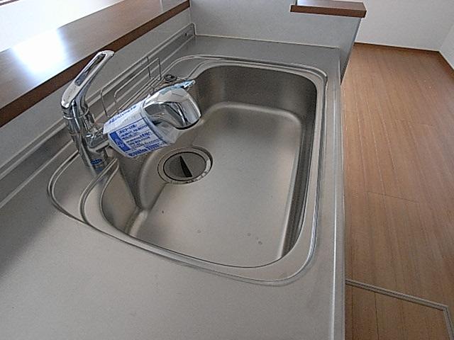 Kitchen. The photograph is a property of the same manufacturer and construction