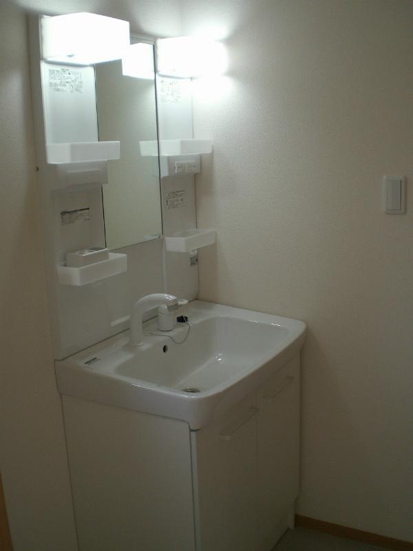 Wash basin, toilet. Bathroom vanity