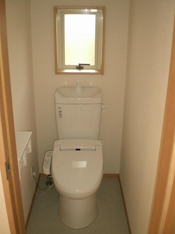 Toilet. It is a warm water washing toilet seat