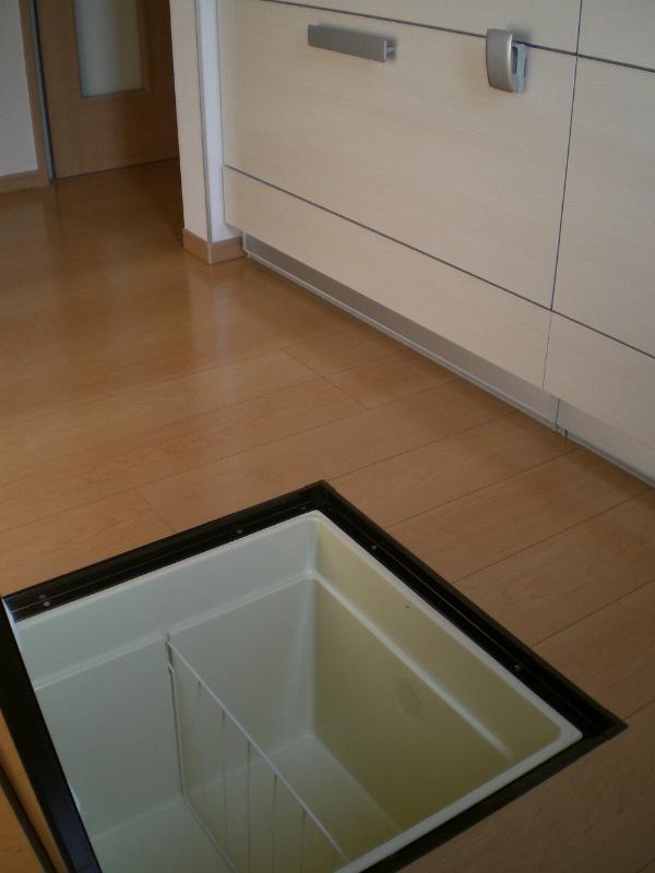 Kitchen. The kitchen is equipped with under-floor storage