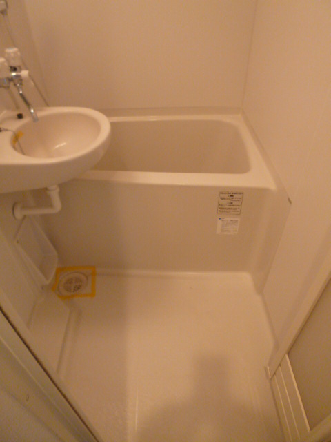 Bath. Room is a bathroom.