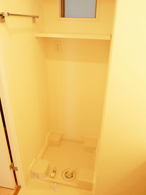 Other Equipment. Washing machine in the room