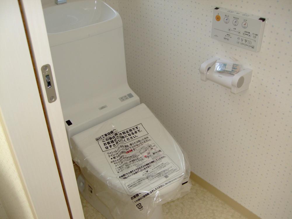 Toilet. First floor warm water cleaning toilet seat