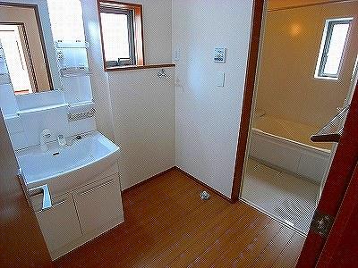 Wash basin, toilet. The photograph is a property of the same manufacturer and construction