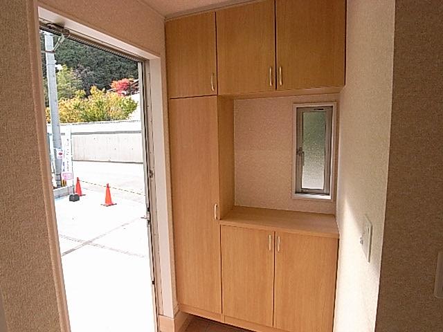 Entrance. The photograph is a property of the same manufacturer and construction