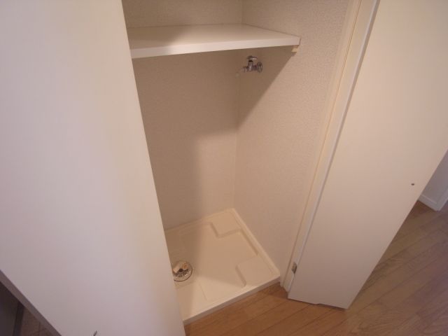 Other Equipment. Washing machine in the room