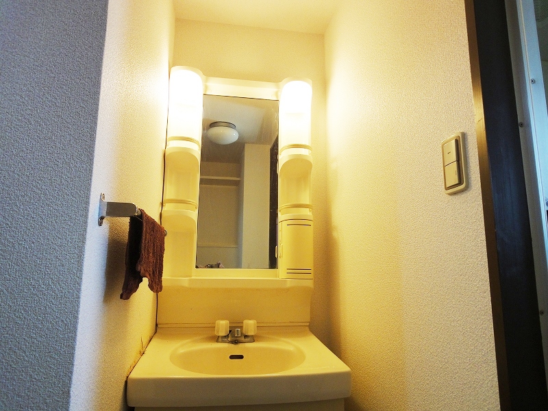 Washroom. Independent wash basin with a dressing room