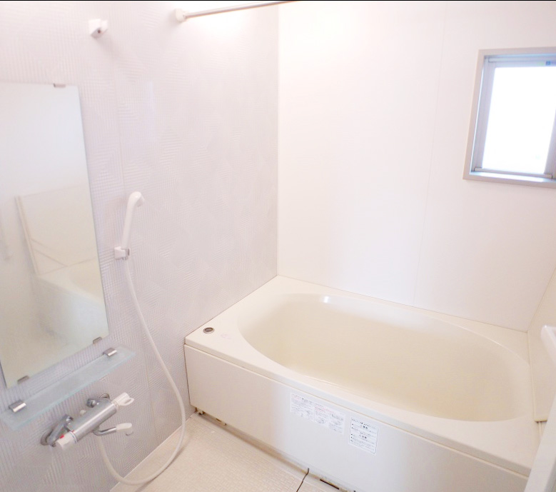 Bath. Bathroom is also quite large! It is bright and there is also a window