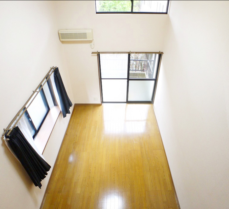 Living and room. There a lot of window is bright rooms