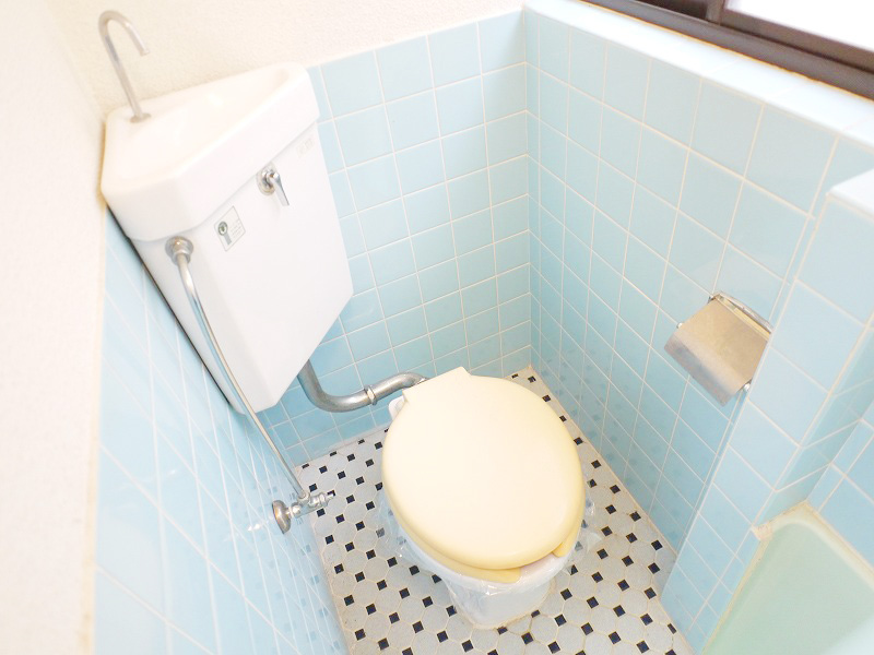 Toilet. Toilet is also bright and there is a window