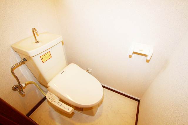 Toilet. Washlet is with