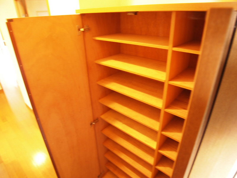 Entrance. Footwear box height size. Boots are placed on top because the partition is not be removed