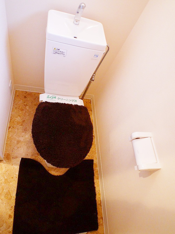 Toilet. It is bright and there is a window in the toilet ~