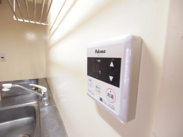 Kitchen. Temperature regulation Rakuchin hot water supply panel. 