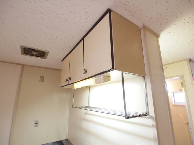 Kitchen. Also with hanging cupboard in the kitchen top. 