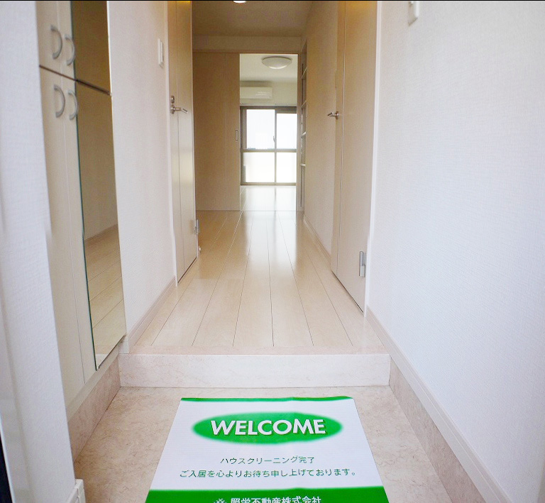 Entrance. The entrance has cupboard storage plenty!