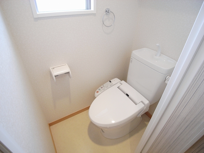 Toilet. Bidet in the window with toilet