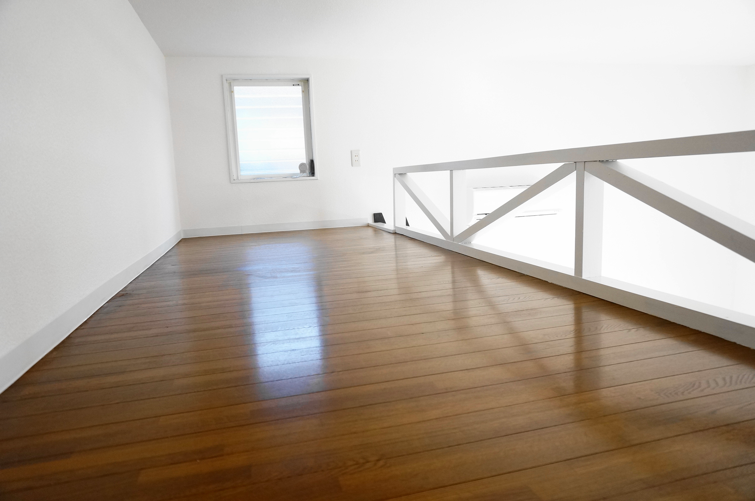 Other room space. There is a window in the loft space