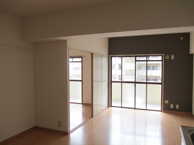 Living and room. Is the room shine with accent Cross