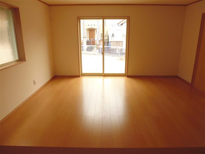 Local appearance photo. Living room seen from the kitchen