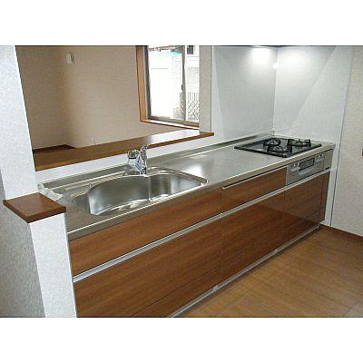 Kitchen. Counter kitchen overlooking the oasis of family!