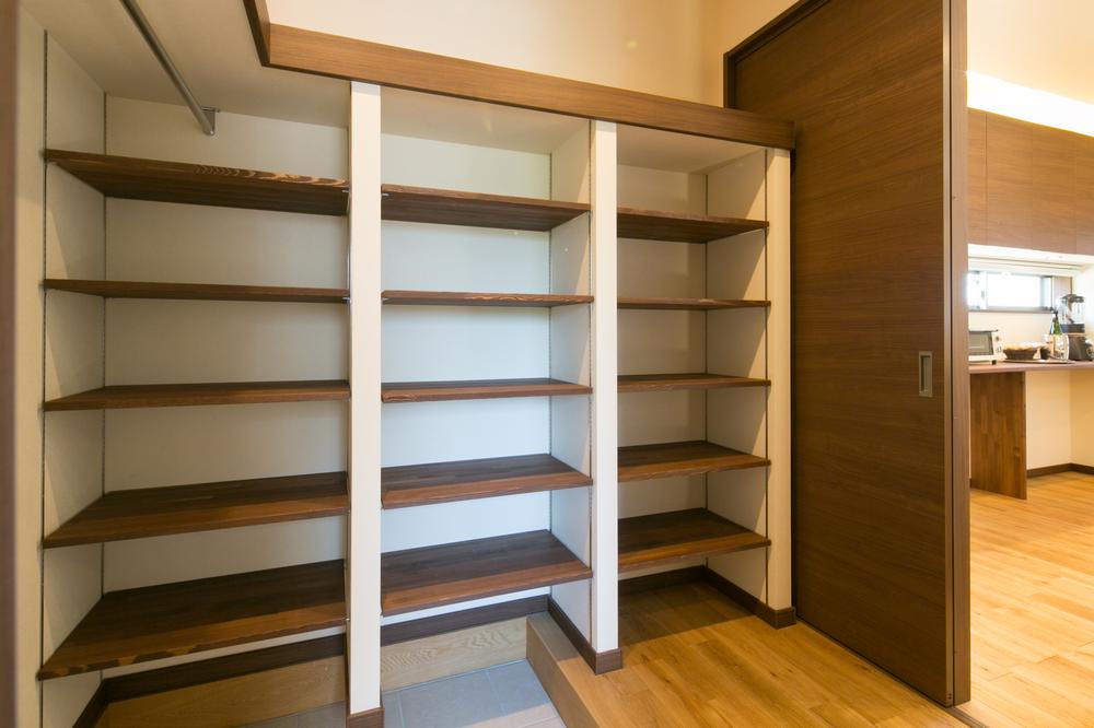 Large shoes in cloak