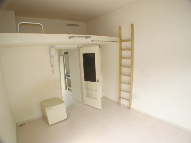 Living and room. 101 is a photograph of the room in Room.