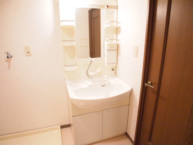 Washroom. Large is a wash basin. 