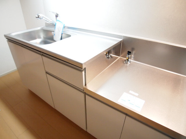 Kitchen. Cooking space, Sink is also a kitchen spread.