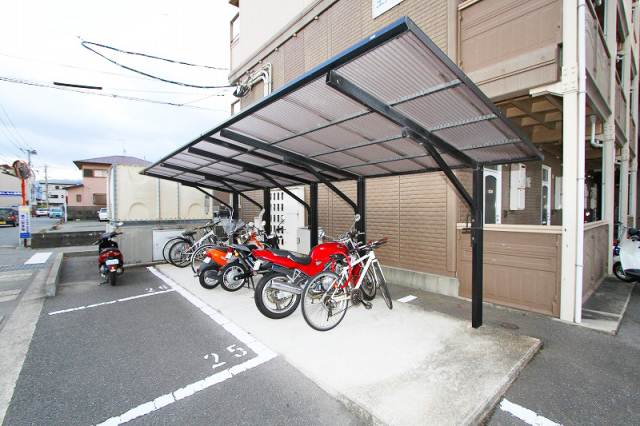 Other common areas. There are bicycle parking lot with a roof