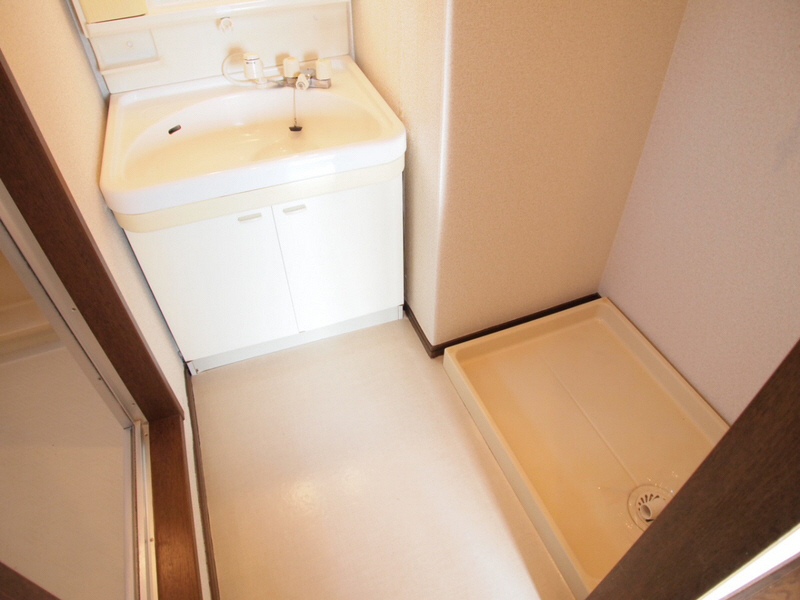 Washroom. Shampoo is a wash basin with a dresser.