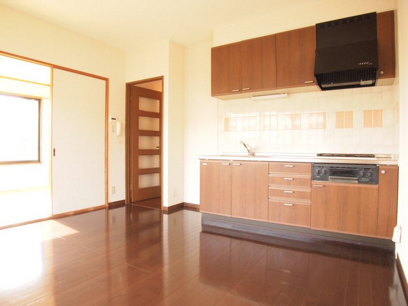 Living and room. It is flooring that cleanliness of Brown.