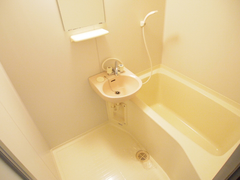 Bath. It is a bathroom with wash basin.