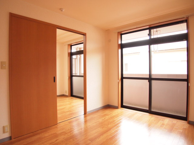 Living and room. The window is a bright big.