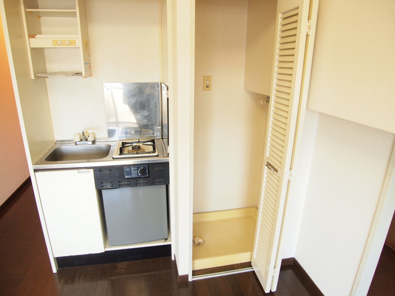 Other room space. Washing machine has is hide.