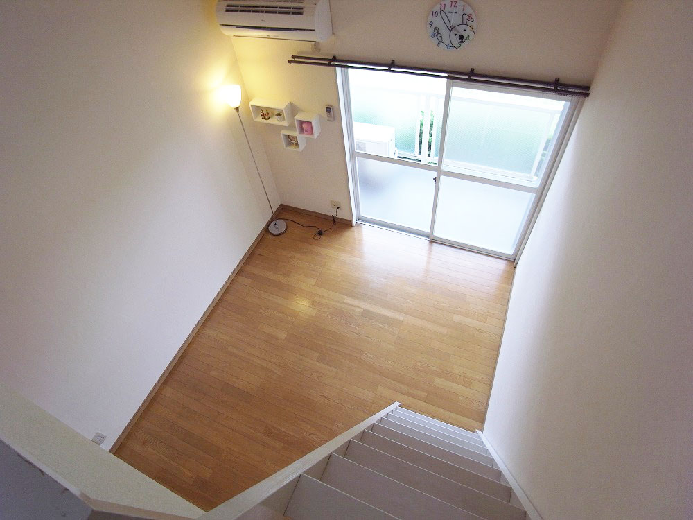 Living and room. Angle shot from the loft