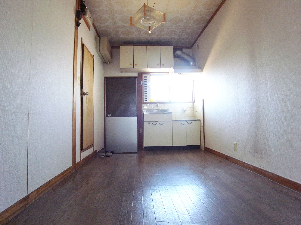 Other room space. Kitchen windows us with bright