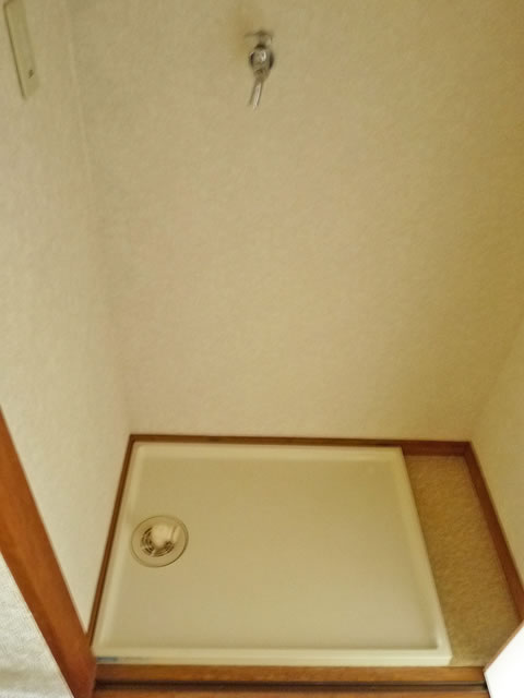 Other Equipment. Washing machine in the room