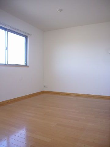 Other room space. With bay windows in the corner room.