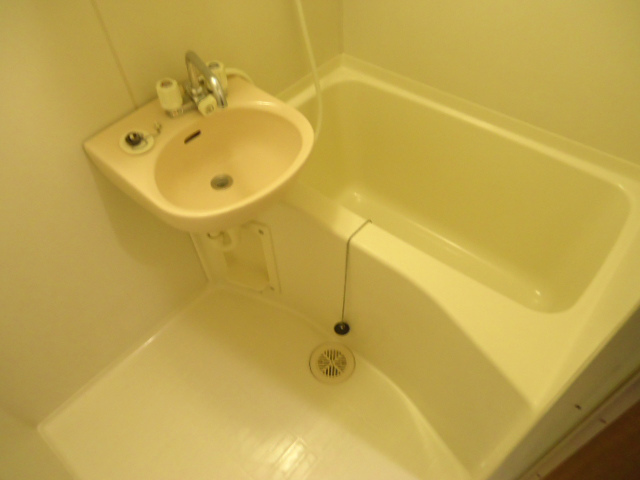 Bath. It is with a basin